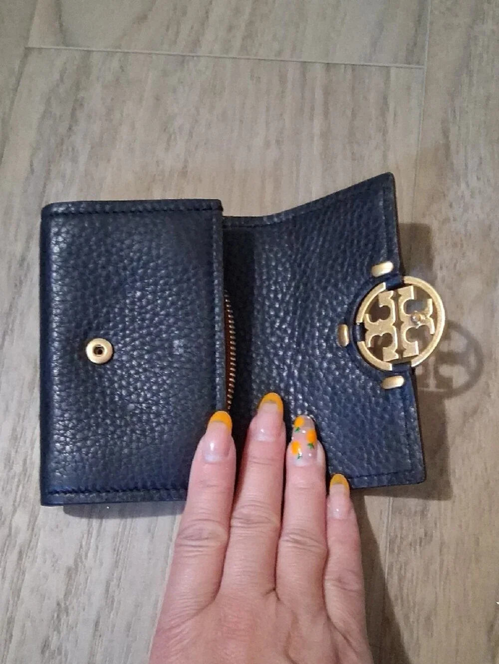 Tory Burch Black Pebbled Leather Trifold Wallet with Gold Emblem